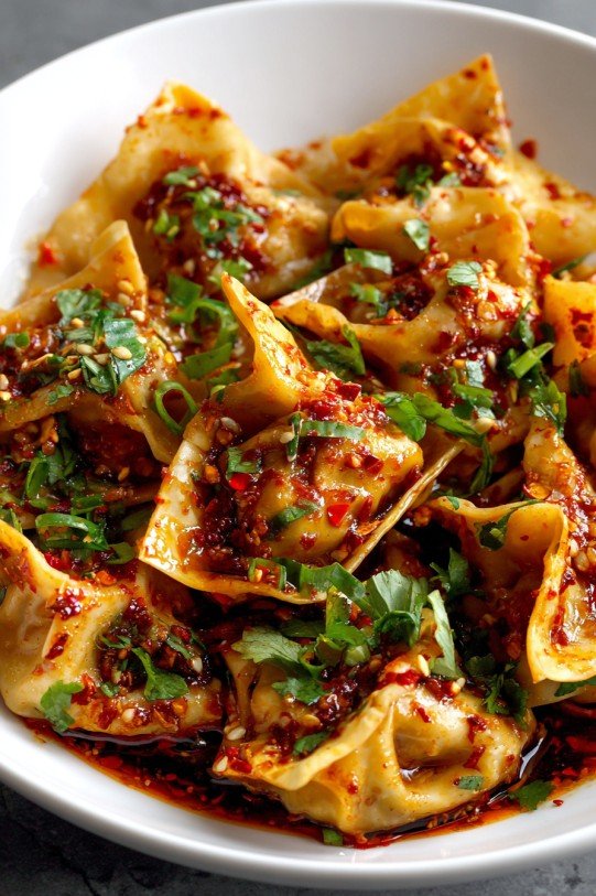 Chicken Wontons in Spicy Chili Sauce