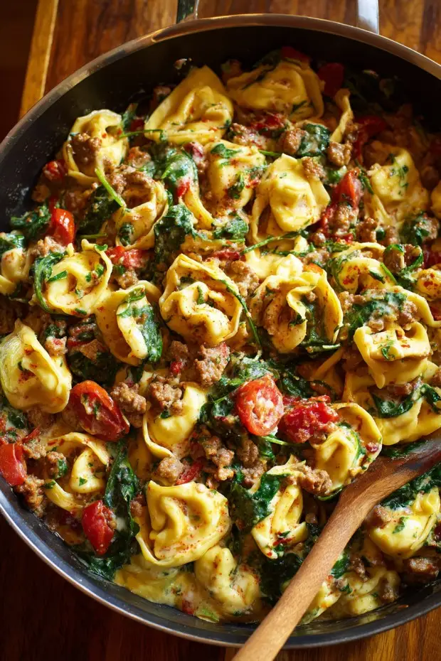 Creamy Tortellini with Sausage, Spinach, Tomatoes, and Mozzarella